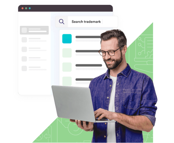 Man searching trademark on laptop